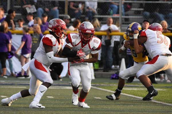 How can UK youth sports programs foster leadership skills in young athletes?