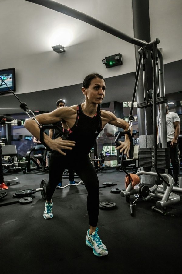 What are the best exercises for improving flexibility and strength in competitive gymnasts?